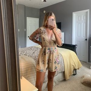 Floral embroidered plunge neck romper